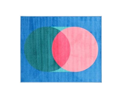 Abstrakt geometrisk matta med blå, rosa och gröna cirklar